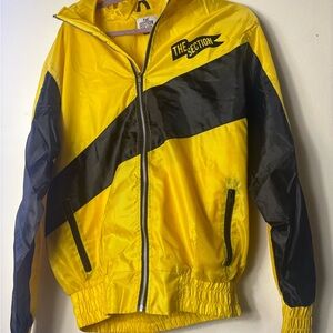 The section xxl  men’s Yellow and Black Windbreaker Jacket